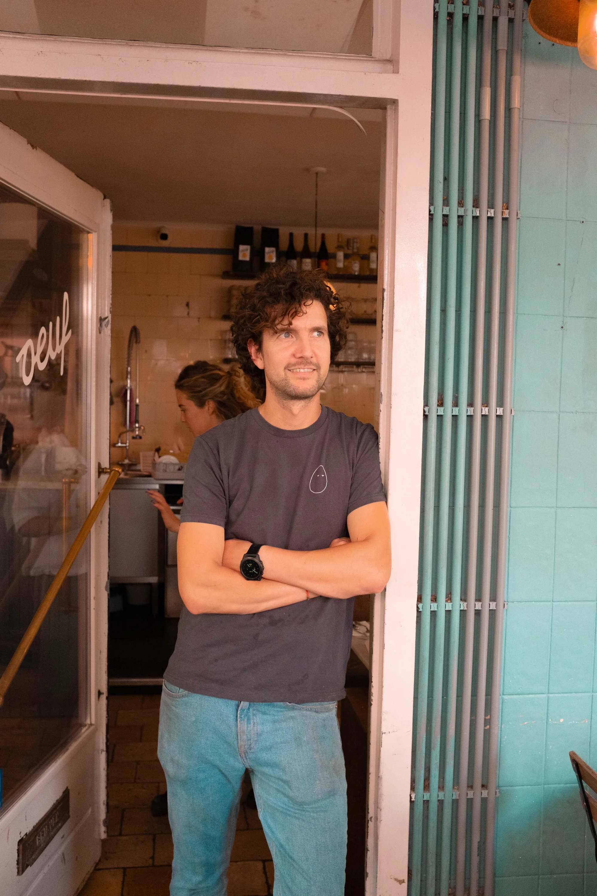 Barista preparing specialty coffee at Oeuf Amsterdam